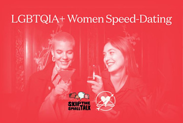 Two women talking and laughing.