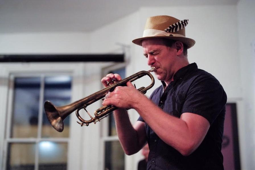 A man playing the trumpet.