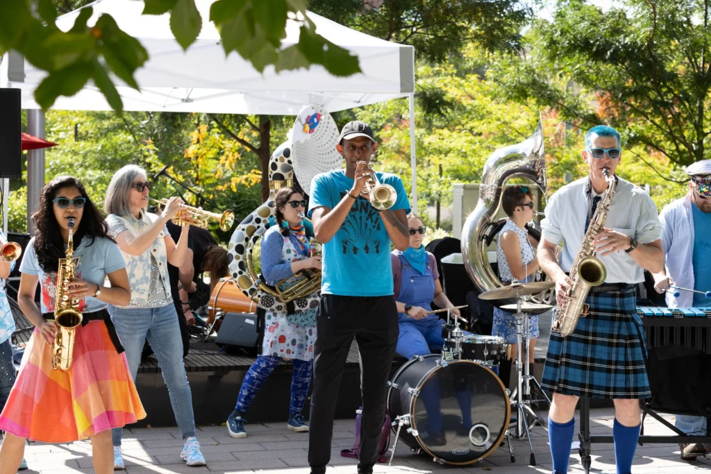 People playing music at an outdoor event