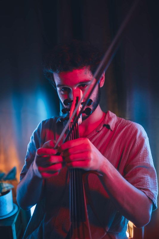 A man with a violin.