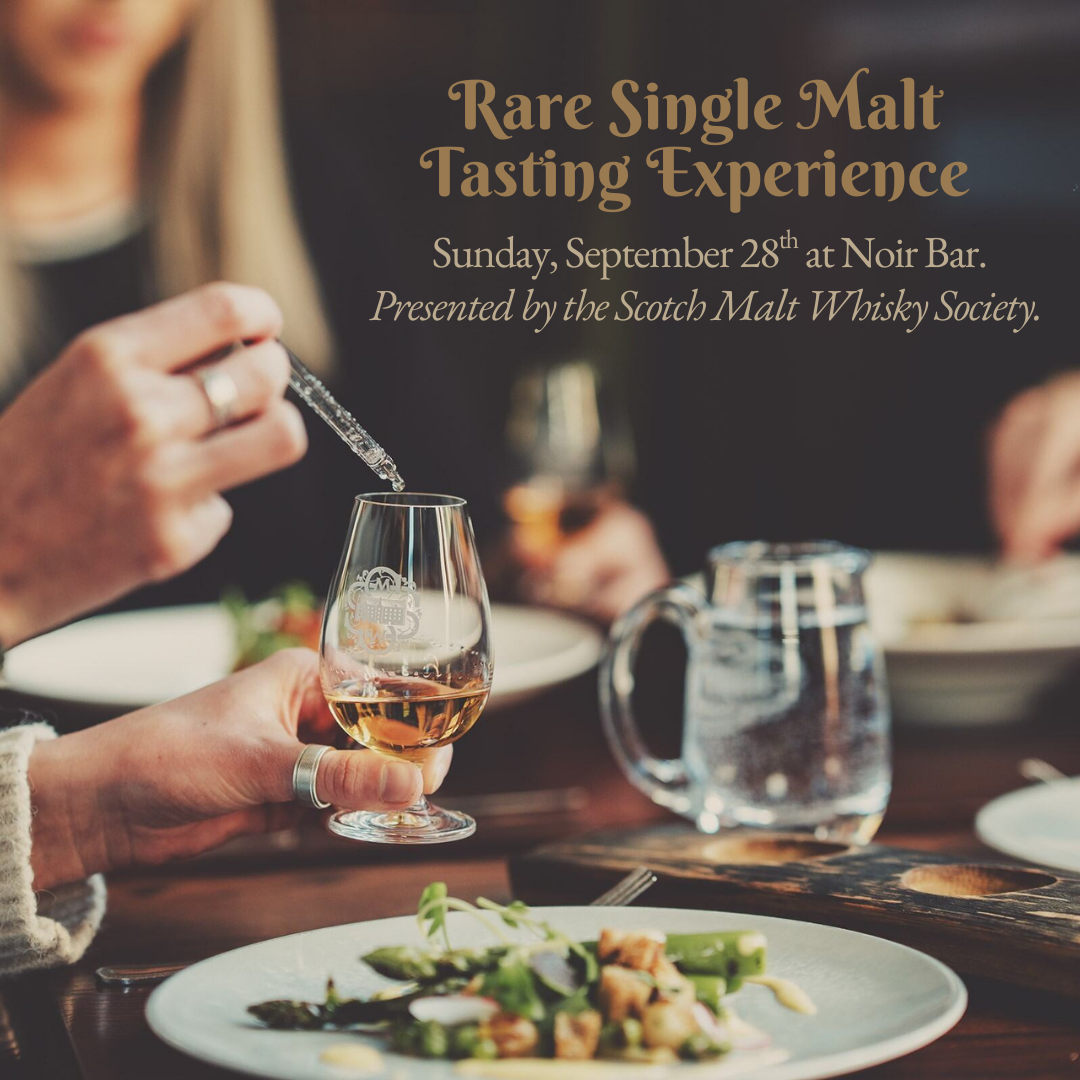A photo of food and whiskey.