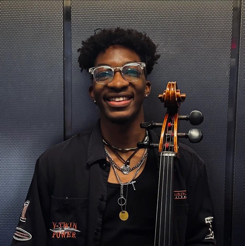 The musician, Walker, with his instrument