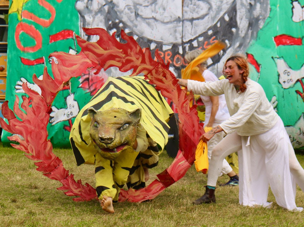 Woman with a paper-mache tiger