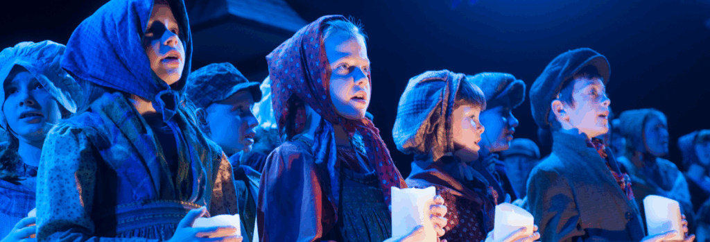 Children singing in costume.