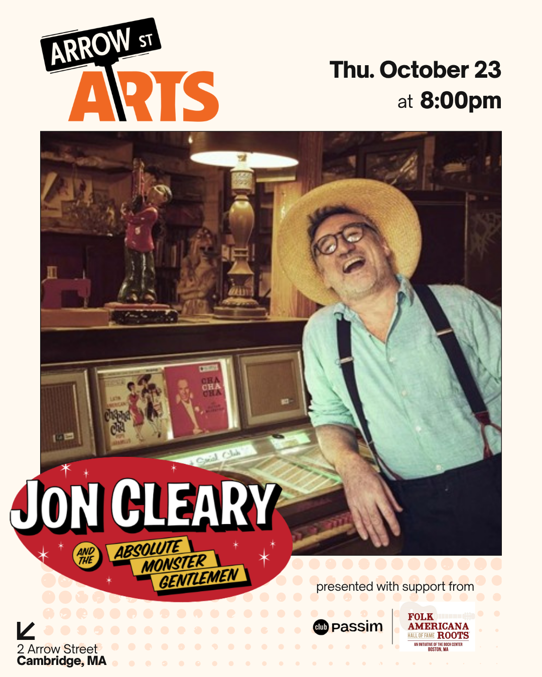 Jon Cleary laughing and leaning against records.